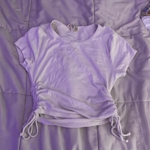 white crop top with scrunch on the side